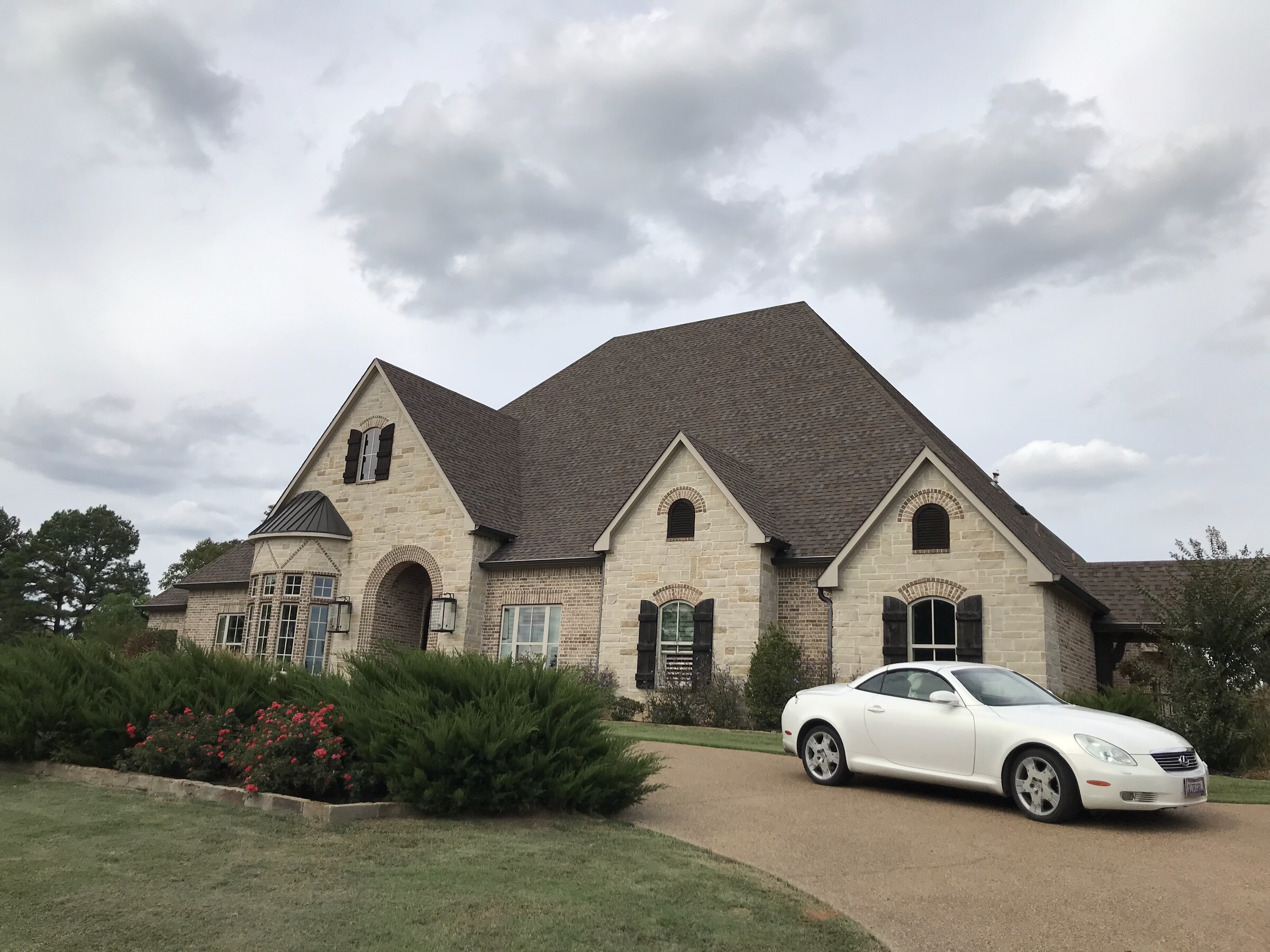 Tyler TX roof repair — professional roofers at work